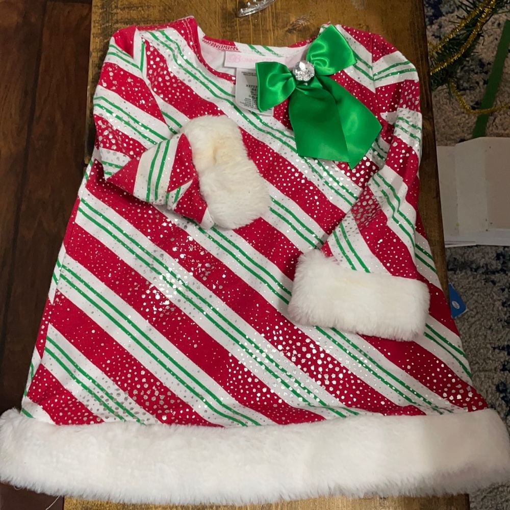 Christmas dress. Small stain on right cuff untreated